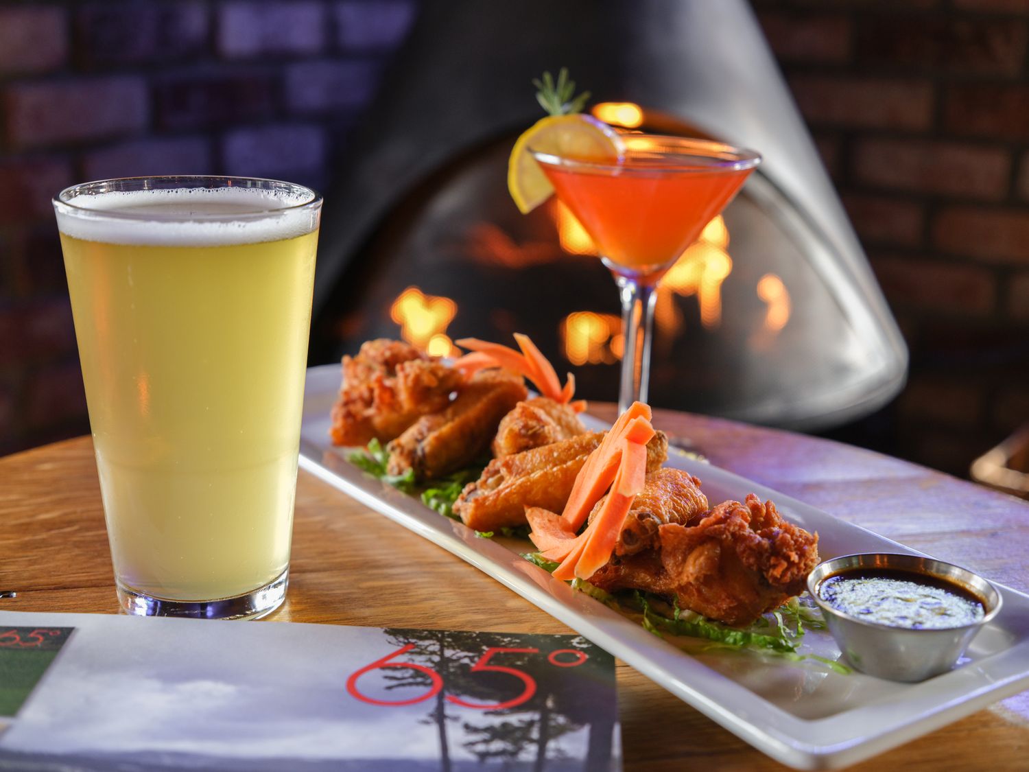Crispy chicken wings with fireside cocktail at O'Callaghan's Irish Pub